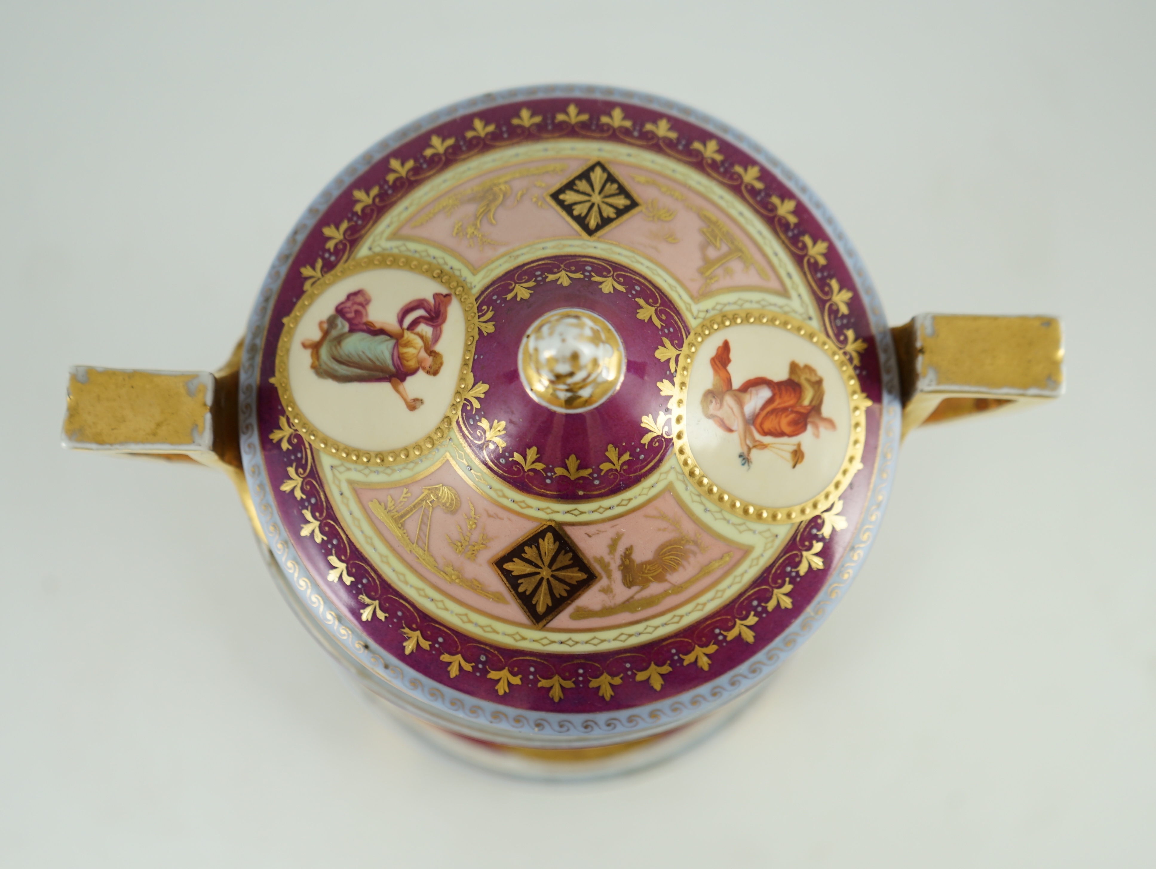 A Vienna style porcelain two handled cup, cover and stand, late 19th century, 42 cm high